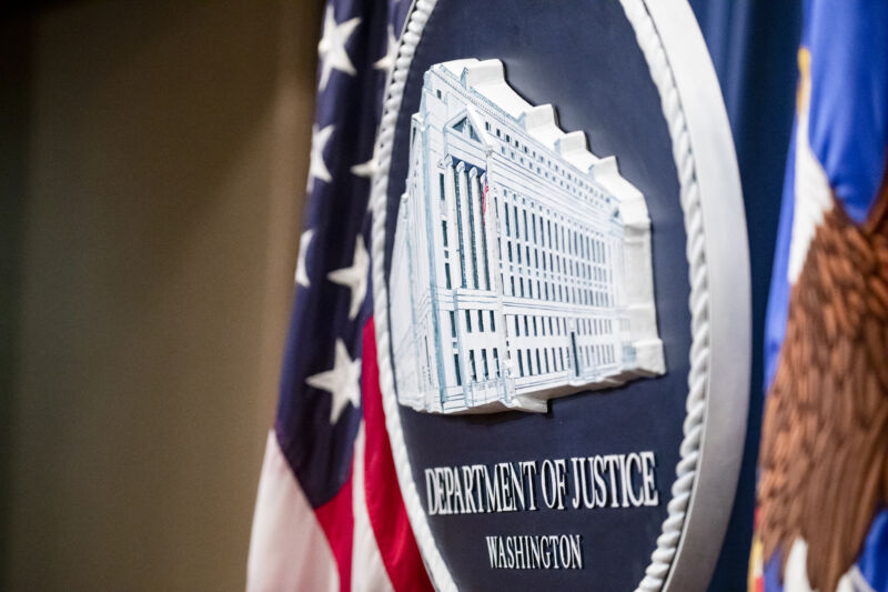 The Department of Justice seal as seen during a press conference in December 2019. 