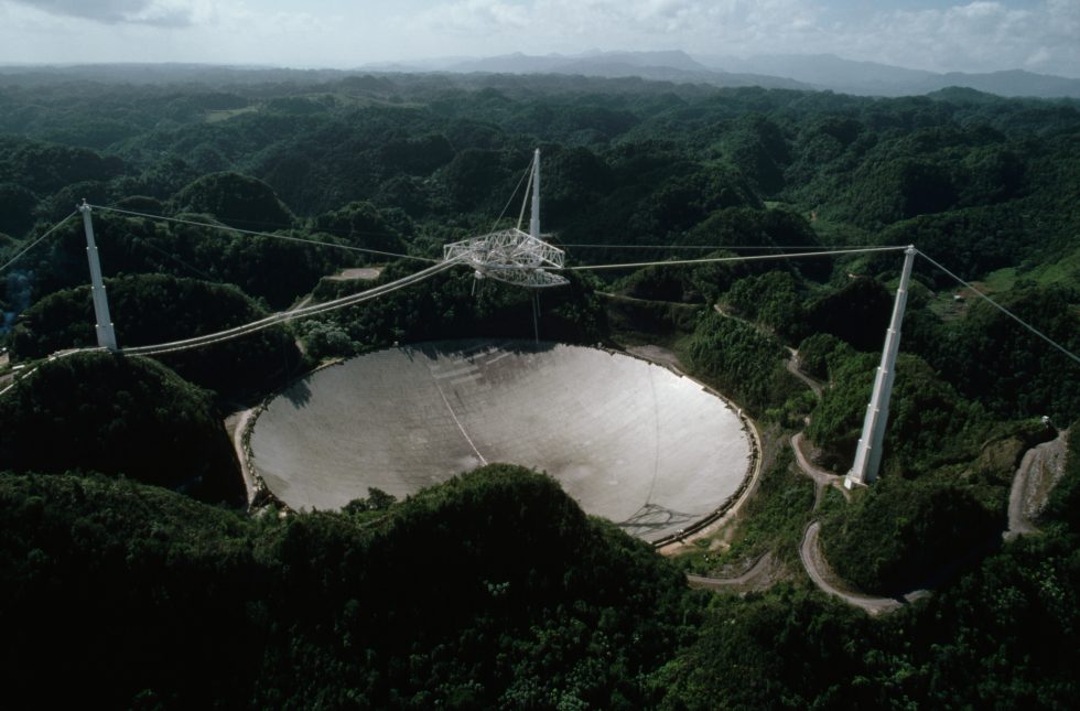 The Arecibo Radio Telescope on Puerto Rico receives interplanetary signals and transmissions. And it was in the movie Contact!