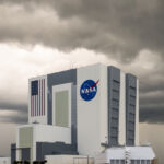 Newly painted meatball on the VAB below moody shelf-cloud filled skies. A very typical 3pm sight at NASA's Kennedy Space Center.