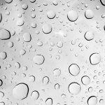 Raindrops on the sunroof (rainroof?) waiting to setup cameras.