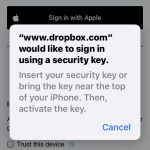 Next, tap the key to the back of the iPhone or insert the 5Ci into the Lightning port and lightly press the metal band.