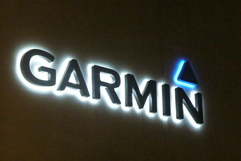 Garmin logo on an dark wall.