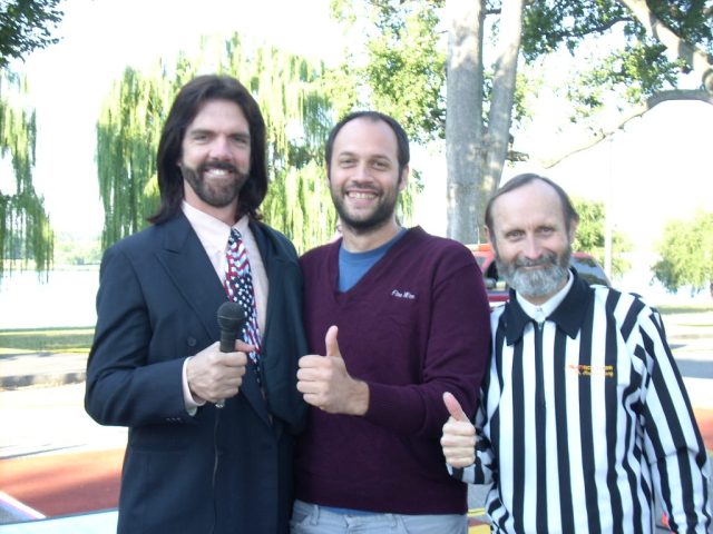 Mitchell (left) and Twin Galaxies founder Walter Day (right) pose with a fan.