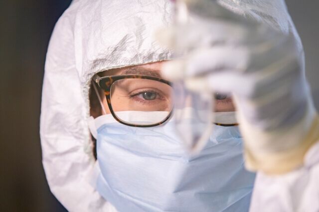 Co-author Ana Duggan, a former postdoc in McMaster's Department of Anthropology, analyzes a viral sample in the laboratory.  