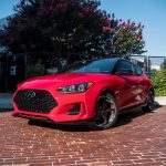 A front 3/4 view of a red Hyundai Veloster Turbo Ultimate