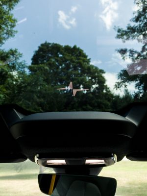 The polestar logo shines onto the roof of a polestar 2