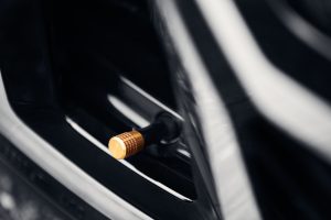 gold anodized valve stem covers on a polestar