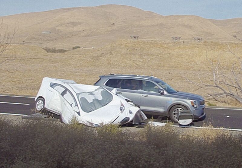 A test vehicle collides with a dummy car at a AAA test track in California.