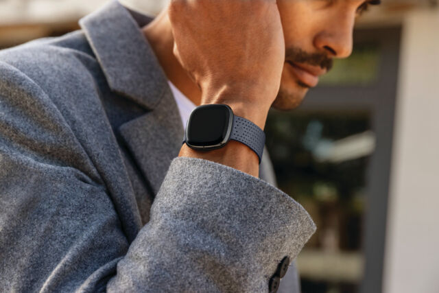 Lifestyle photo of Fitbit Sense.