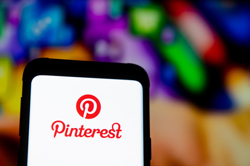 A Pinterest logo seen displayed on a smartphone.