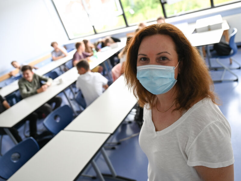 Teacher in school classroom.