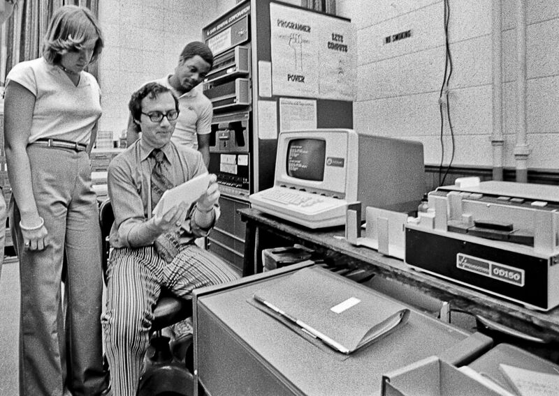 Programmer power, indeed. (Here's a Tufts computer group sometime in the mid to late 1970. Getty caption explicitly states, "Note equipment and 1970s fashions.")