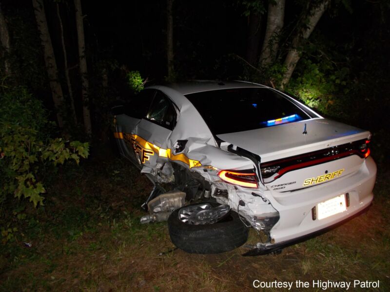 A law enforcement vehicle damaged in Wednesday