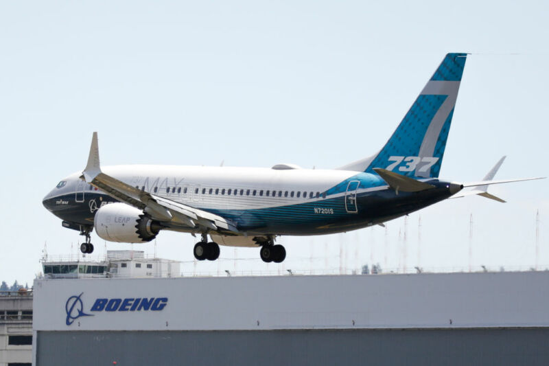 A Boeing 737 MAX jet lands following a Federal Aviation Administration (FAA) test flight at Boeing Field in Seattle, Washington, on June 29, 2020.