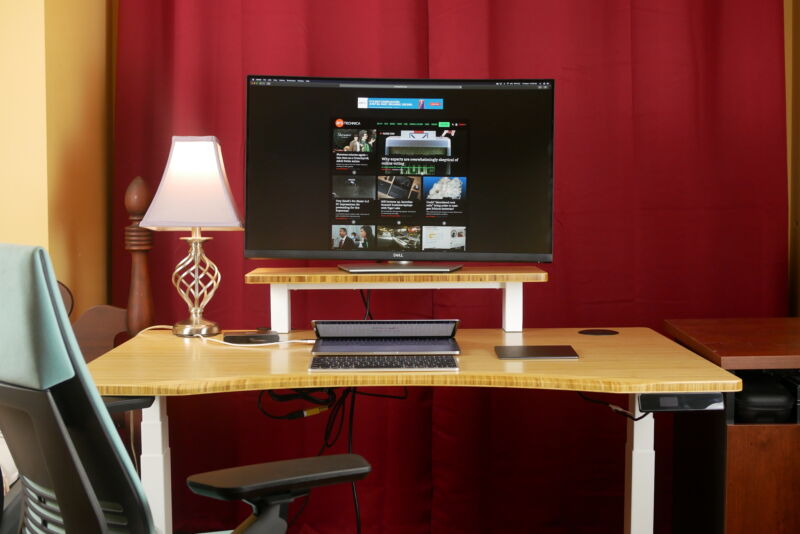 Fully Jarvis Standing Desk with a computer and monitor set up