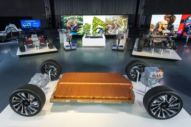 EV battery packs and motors arranged on display at GM
