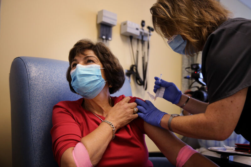 Woman receives an experimental COVID-19 vaccine at the University of Massachusetts Medical School in Worcester, MA on September 04, 2020, as part of a clinical trial.