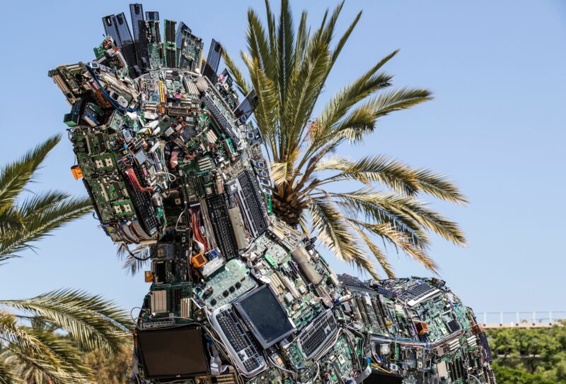 A replica of the Trojan horse made up of thousands of computer and mobile phone components infected with various viruses and malware, named the "Cyber Horse" is displayed at the entrance to the annual Cyber Week conference at the Tel Aviv University in the Israeli city of Tel Aviv on June 20, 2016. The Cyber Horse is a piece of art composed of devices that can be harmed by malware and was created in order to prompt national and international awareness of the dangers of cyber-attacks. 