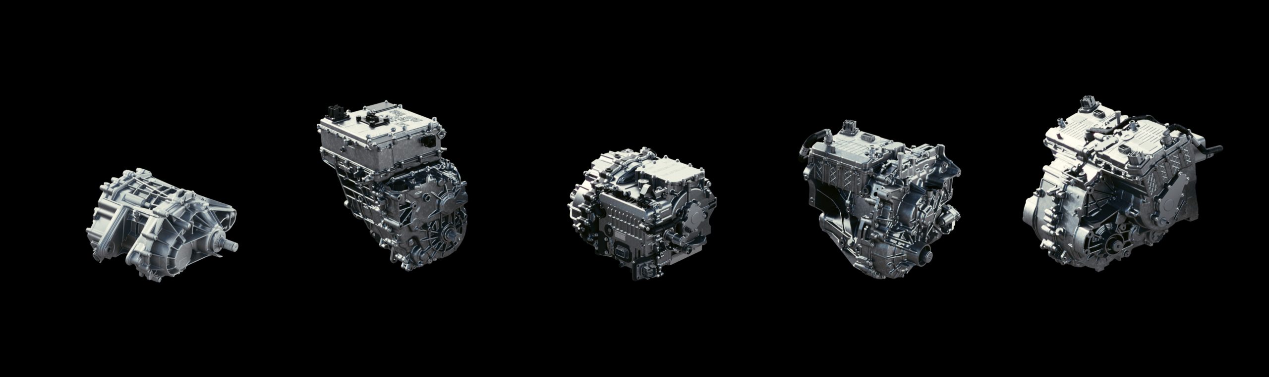 Five electric drive units on a black background