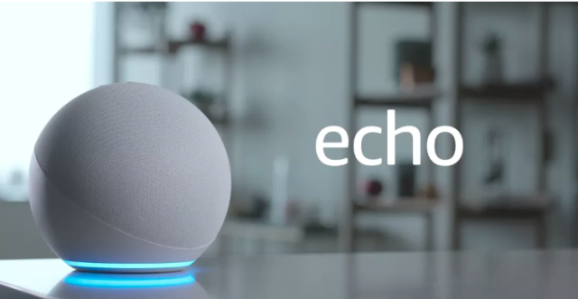 The fourth-generation Echo device is a cloth-covered sphere with a halo at the base, contrasting with the squat plastic cylinders of earlier-generation Echoes.