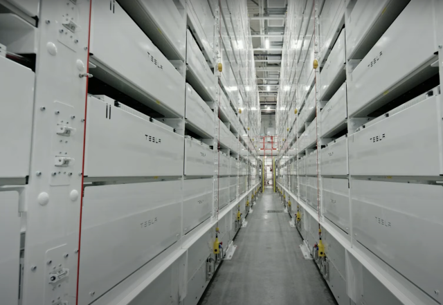 Tesla has developed vast facilities for "formation," the stage where a completed cell is charged for the first time and tested for quality. Each of these cabinets has slots to charge and test dozens of cells. Robots load and unload the cabinets.