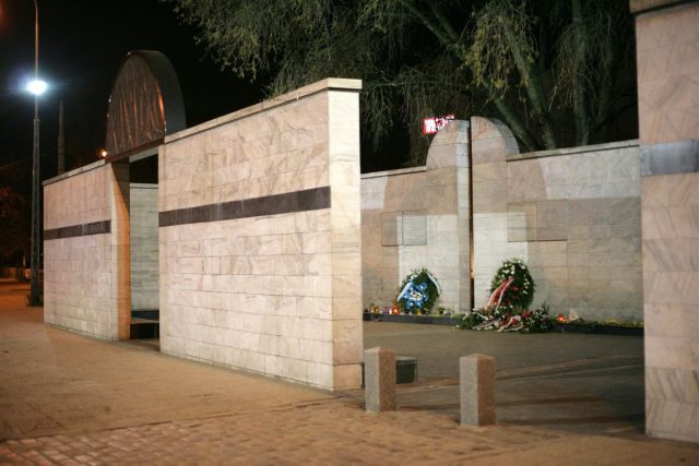 National monument at the Ghetto's former <em>Umschlagplatz</em>—the term used to denote the holding areas adjacent to railway stations, where Jews from ghettos were assembled for deportation to Nazi death camps—symbolizing an open freight car. Stawki Street, Warsaw.