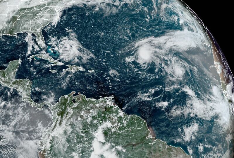 A satellite image of the state of play Thursday across the tropics.