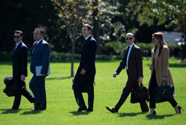 (L-R) Assistant to the President and Director of Oval Office Operations Nicholas Luna, Assistant to the President and Deputy Chief of Staff for Communications Dan Scavino, Senior Adviser to the President of the United States Jared Kushner, Senior Adviser to the President Stephen Miller, and Counselor to the President Hope Hicks walk to Marine One to depart from the South Lawn of the White House in Washington, DC, on September 30, 2020. 
