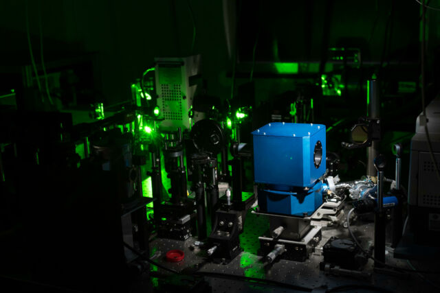 Equipment including a diamond anvil cell (blue box) and laser arrays are pictured in the lab of assistant professor of Mechanical Engineering and Physics and Astronomy Ranga Dias in Hopeman Hall August 26, 2020. Dias is studying the potential and applications of room temperature superconductivity in dense hydrogen-rich materials and carbon based materials. (Photo by J. Adam Fenster / University of Rochester)