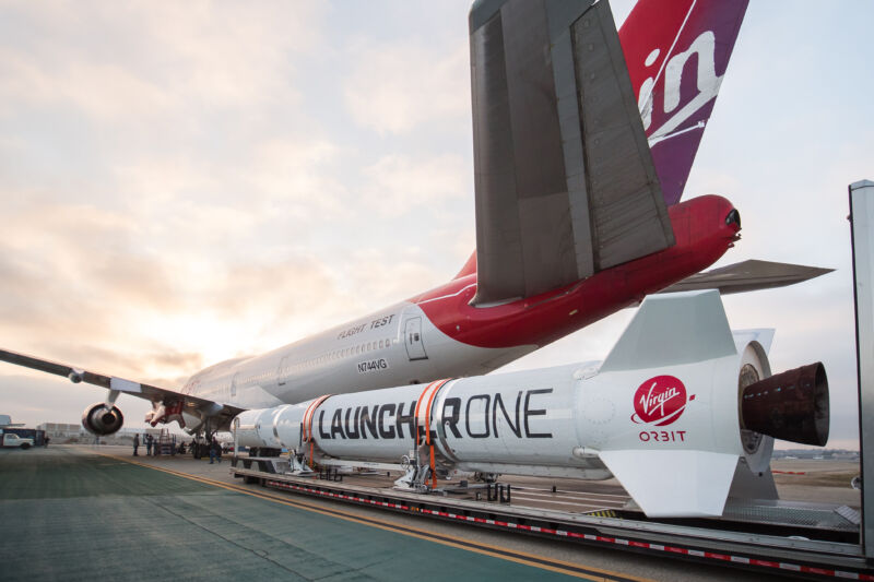 Photo of Cosmic Girl aircraft and LauncherOne rocket.