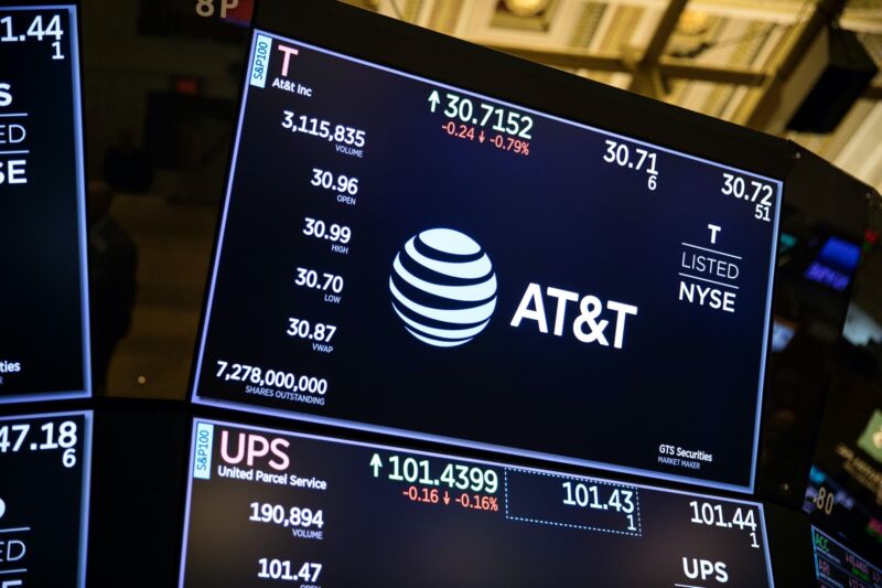 AT&T's logo and stock price displayed on a monitor on the floor of the New York Stock Exchange in January 2019.