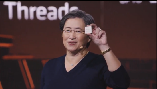 AMD CEO Lisa Su holds up a Zen 3 CPU at today