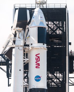Image of a Falcon 9 rocket and Crew Dragon spacecraft.