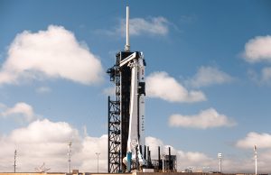 Image of a Falcon 9 rocket and Crew Dragon spacecraft.