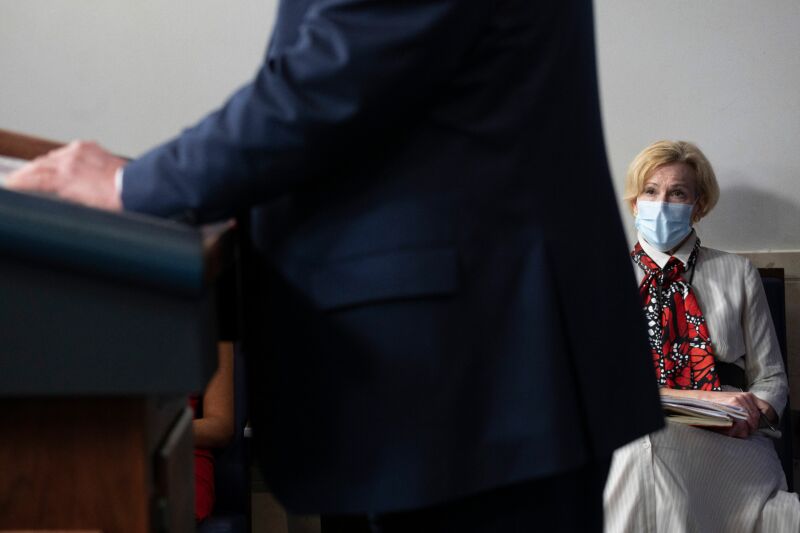 Response coordinator for White House Coronavirus Task Force Deborah Birx wears a facemask she listens to US President Donald Trump deliver a news conference in the Brady Briefing Room of the White House in Washington, DC, on July 23, 2020. 