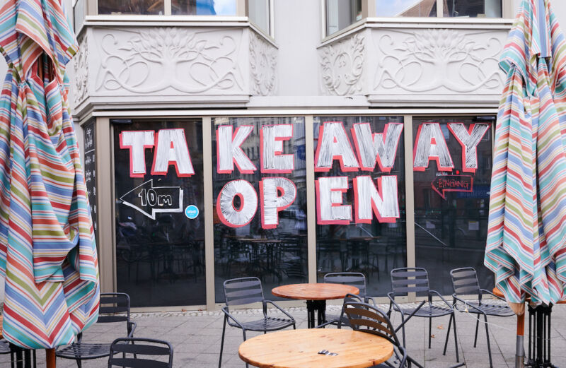 Image of a restaurant with a large sign saying 