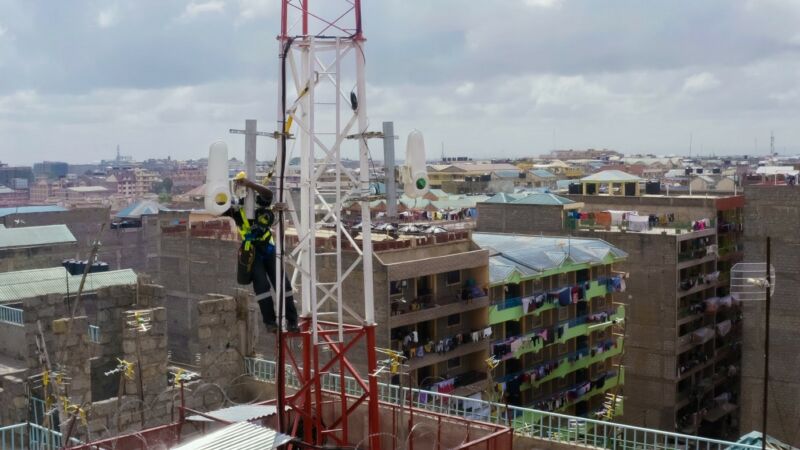 A wireless communication terminal on the rooftop of a large building in Kenya.
