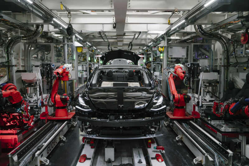 A Tesla Model 3 is seen in the general assembly line at the Tesla factory in Fremont, California, in July 2018.