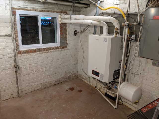 A condensing boiler is more efficient than a conventional boiler but it still produces a lot of carbon dioxide.