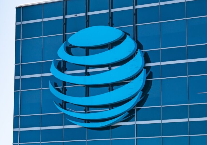 A large AT&T logo seen on the outside of its corporate offices.