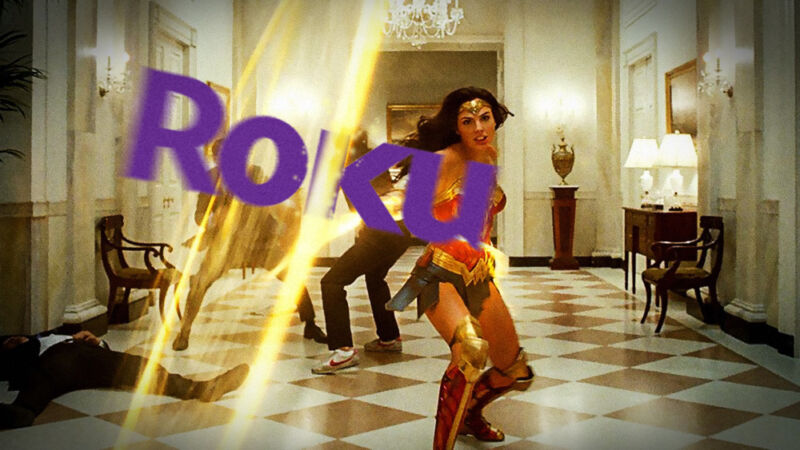 The Roku logo has been photoshopped into a screenshot from Wonder Woman in which the titular character is using her whip against henchmen.