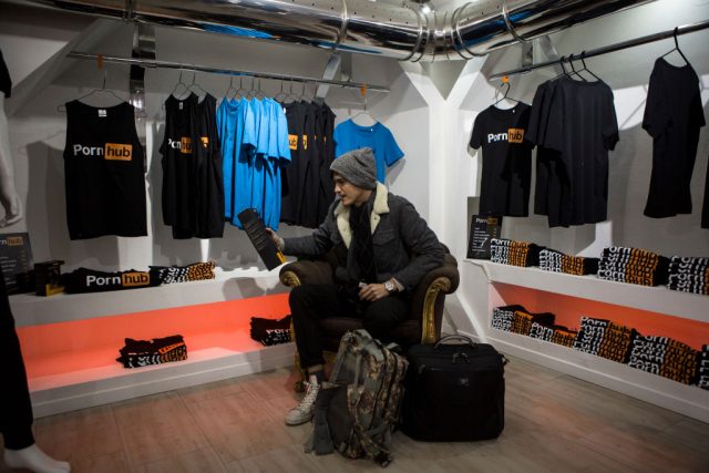 A man sits at the 'Pornhub Christmas Store' on December 1, 2017 in Milan, Italy. 