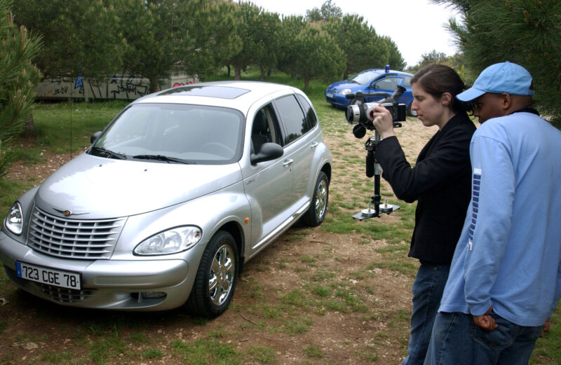 Director Maurice Dwyer leads the cast and crew in his production of <em>Cop Block</em>, which prominently featured the Chrysler PT Cruiser, at the 2002 Cannes Film Festival.