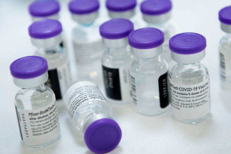 Vials of undiluted Pfizer COVID-19 vaccine are  prepared to administer to staff and residents at the Goodwin House Bailey's Crossroads, a senior living community in Falls Church, Virginia, on December 30, 2020. 