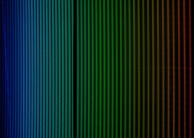 Image of a series of parallel lines in different colors.