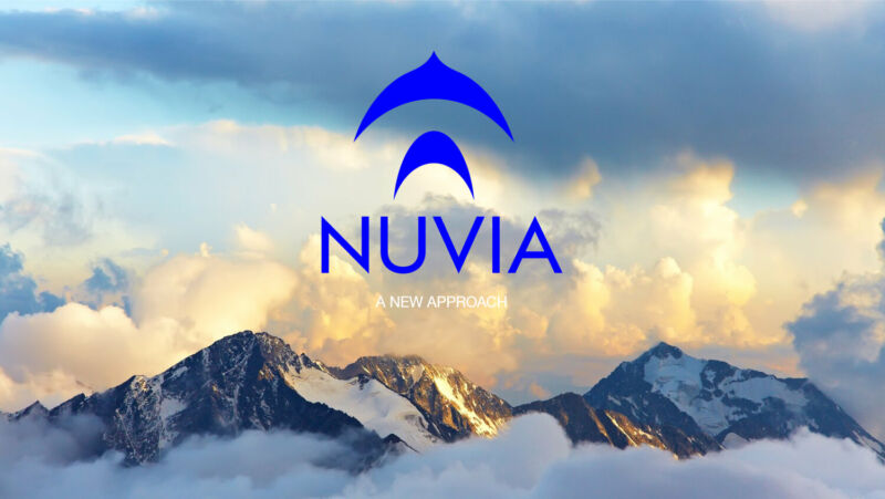 A logo of company sits on top of a cloud-swollen mountain.