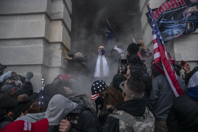 A mob of Trump supporters tries to break into the Capitol building on January 6, 2021.