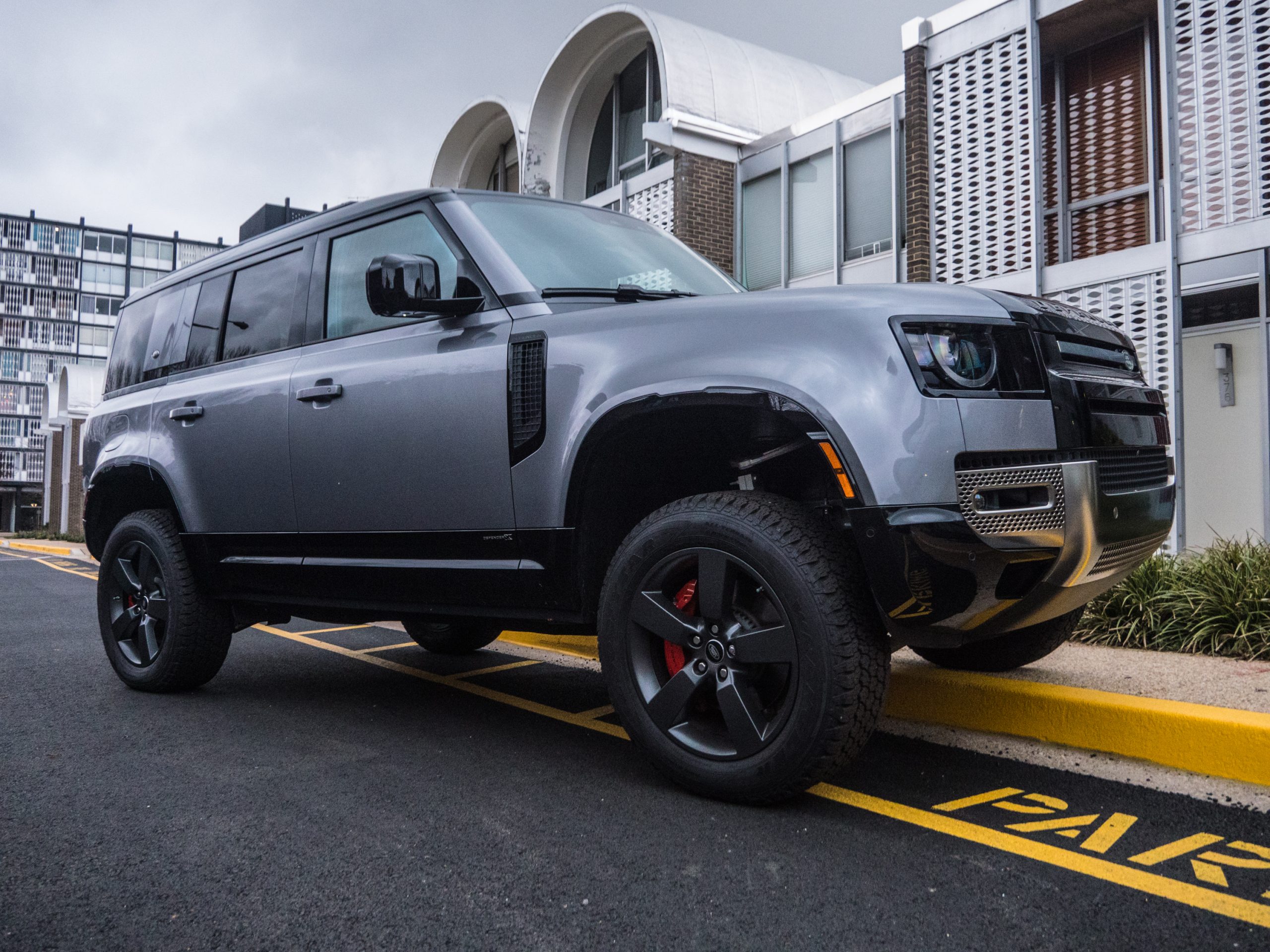 The Land Rover Defender—rugged, charming, but drinks like a fish