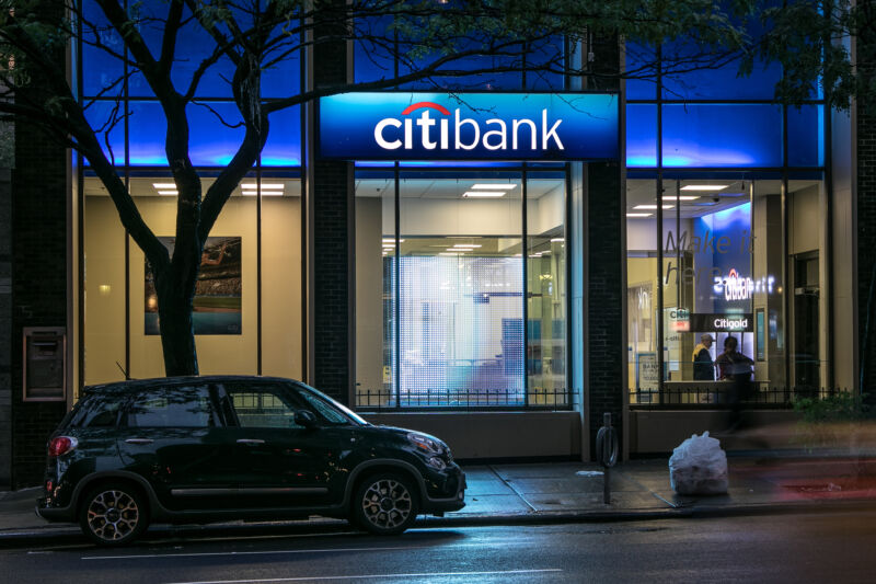 A streetside Citibank banking location at night.