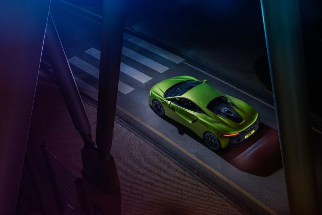 A green McLaren Artura as seen from above